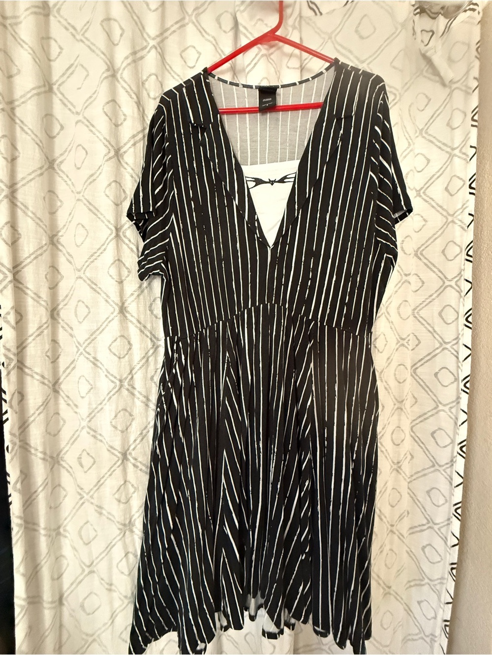 Torrid Jack Skeleton Dress. Black and White Vertical Stripe V-Neck Dress
